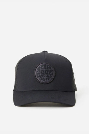 The Rip Curl Wetsuit Icon Trucker is a black cap made from recycled polyester, featuring a mesh back and circular embroidered logo on the front, shown against a plain white background.