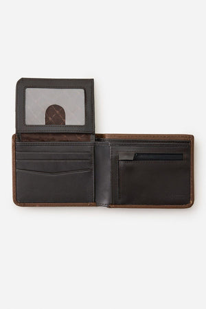 A Rip Curl Wetsuit Logo RFID All Day Wallet in brown leather is shown open on a white background, displaying card slots, a clear ID window, and a zippered coin pocket.