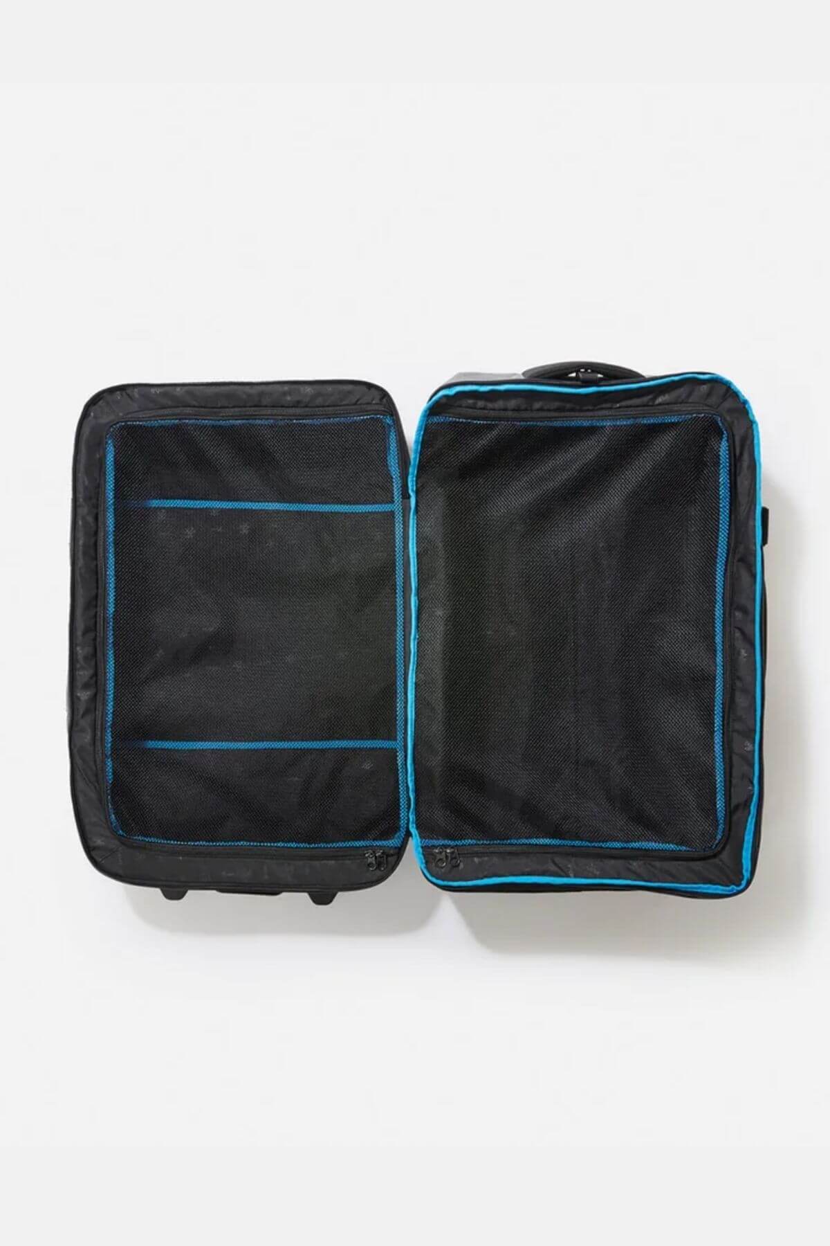The Rip Curl F-Light Global 110L Icons Travel Bag, in black with blue trim, lies open on a white background showing two compartments: mesh pockets on the left and a spacious right side secured by compression straps.