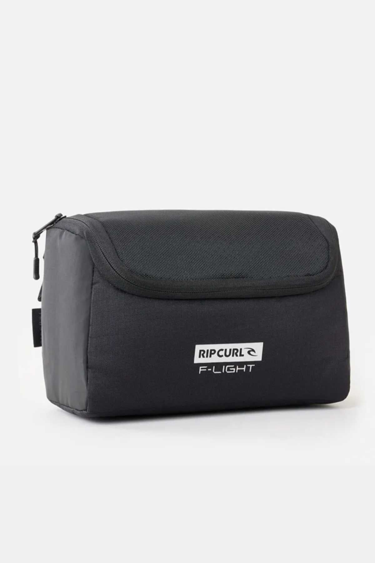 Set against a gray background, the black Rip Curl F-Light Toiletry bag features a zippered top flap, side strap for easy carrying, multiple compartments, and a ventilated mesh section to keep essentials organized and fresh.