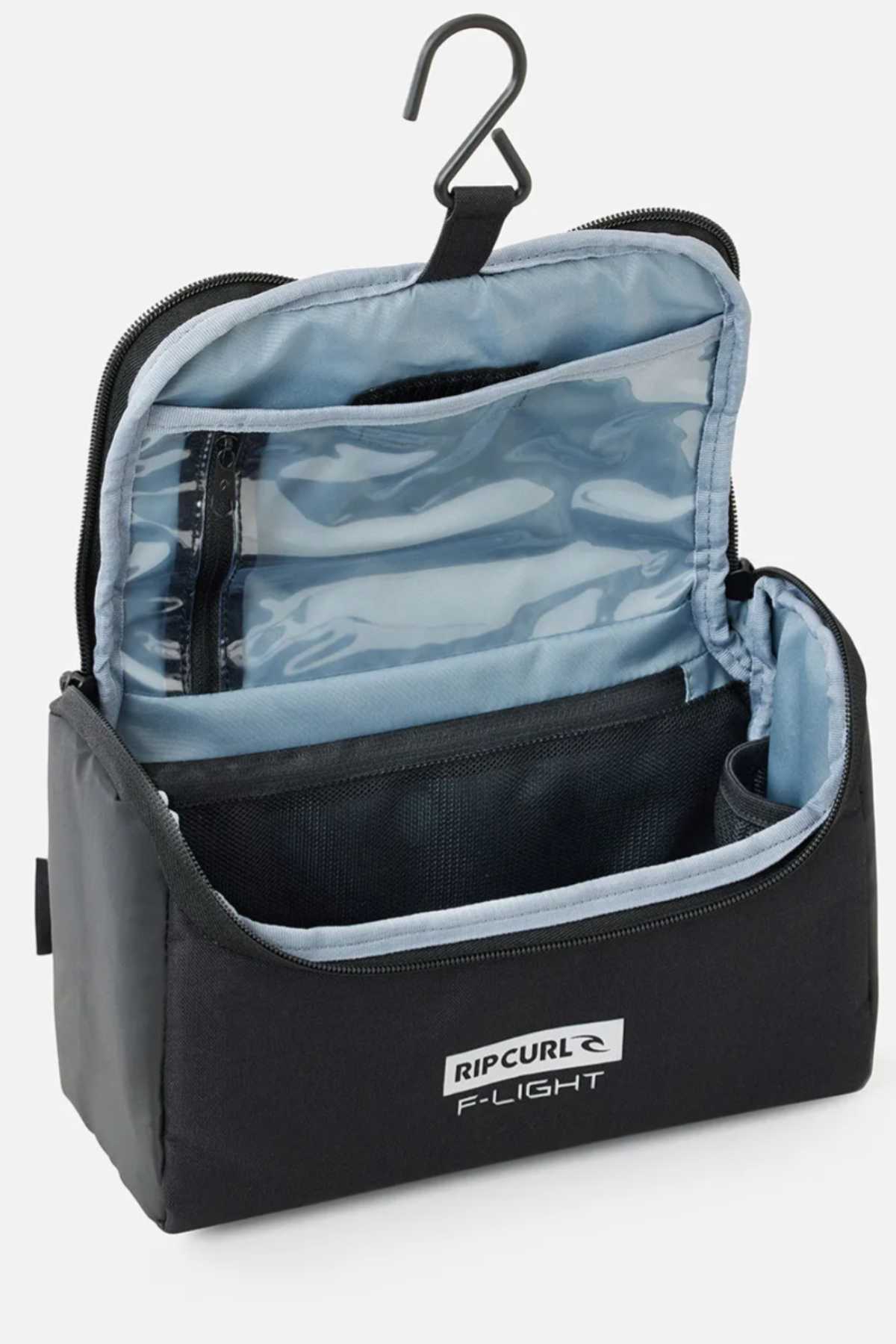 The Rip Curl F-Light Toiletry bag, in black, features a ventilated mesh section and hanger hook. It opens to reveal multiple compartments and a transparent pocket inside, with a durable exterior showcasing the Rip Curl logo for both style and functionality.