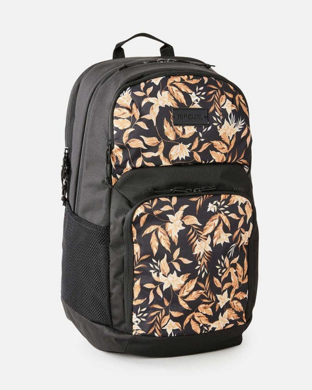 The Rip Curl Chaser 33L Backpack is black, made from recycled polyester, with a large front pocket and top section featuring a brown and beige leaf pattern. It has a side mesh pocket, carrying handle, and fits a 15-inch computer.