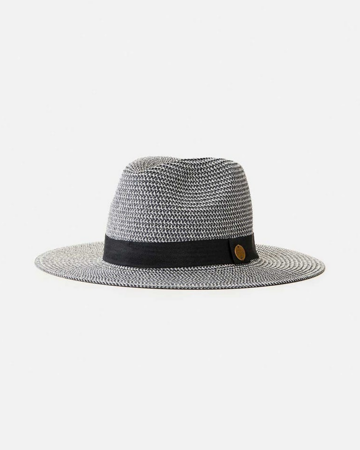 The Rip Curl Dakota Panama is a gray woven fedora hat with a wide brim, crafted from paper yarn fabric. It features a black band and small round logo on the side, making it perfect for outdoor adventures and adds style against a plain white backdrop.
