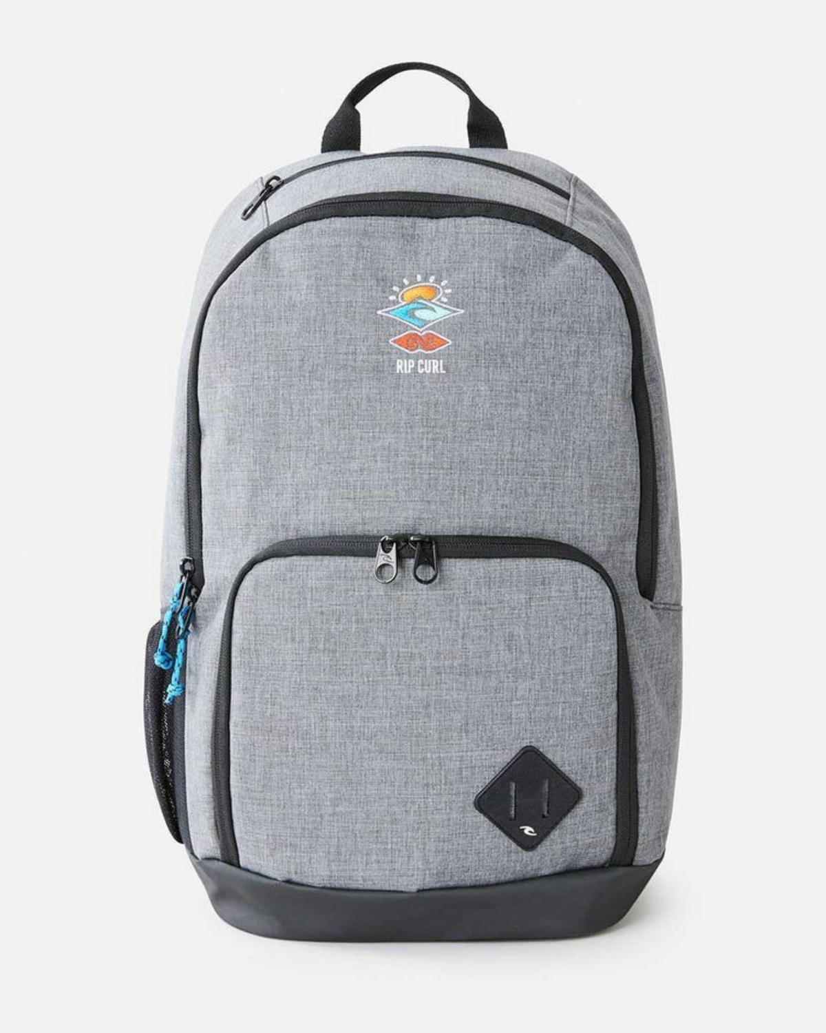 The Rip Curl Evo 24L Icons Of Surf Backpack is made from light gray recycled polyester, featuring black zippers, a black handle, a colorful embroidered logo, two zip compartments, a laptop section, and a small black patch near the bottom.