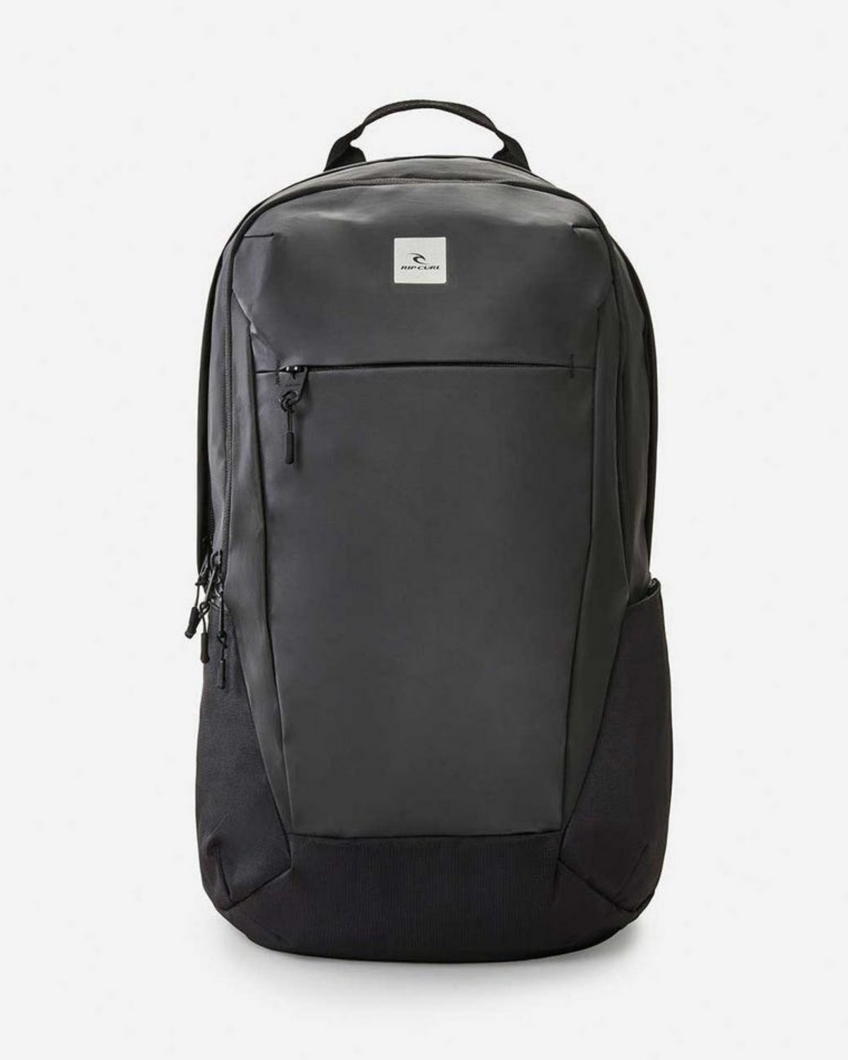 The Rip Curl Overtime 30L Backpack is a sleek black bag made from recycled polyester. It features a minimalist design with side mesh pockets, a front zipper pocket, and a top handle. A small logo patch decorates the upper front, enhanced by smooth, streamlined contours.