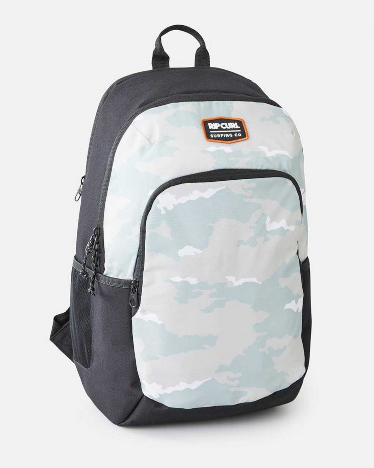 The Rip Curl Ozone 30L School Backpack has a light grey and white camo front pocket, black sides and back, top handle, side pocket, orange/white Rip Curl logo patch, and is made from recycled polyester.