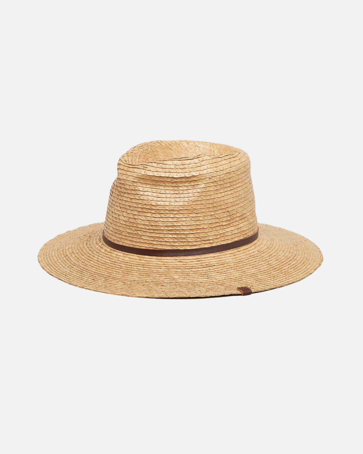 The Rip Curl Palmetto UPF Straw Panama features a wide brim, flat crown, and brown ribbon band, shown against a plain white background.