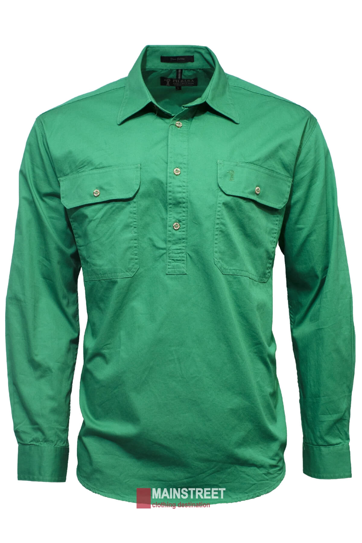 The Ritemate Pilbara Long Sleeve Closed Front Shirt is a green button-up men's work shirt featuring long sleeves, two chest pockets, and a collar. It has metal buttons and an impressive UPF 50+ rating for added protection. A small embroidered design can be seen near one of the pockets. At the bottom of the image, a red-striped logo with the text "MAINSTREET" and "clothing destination" is visible.