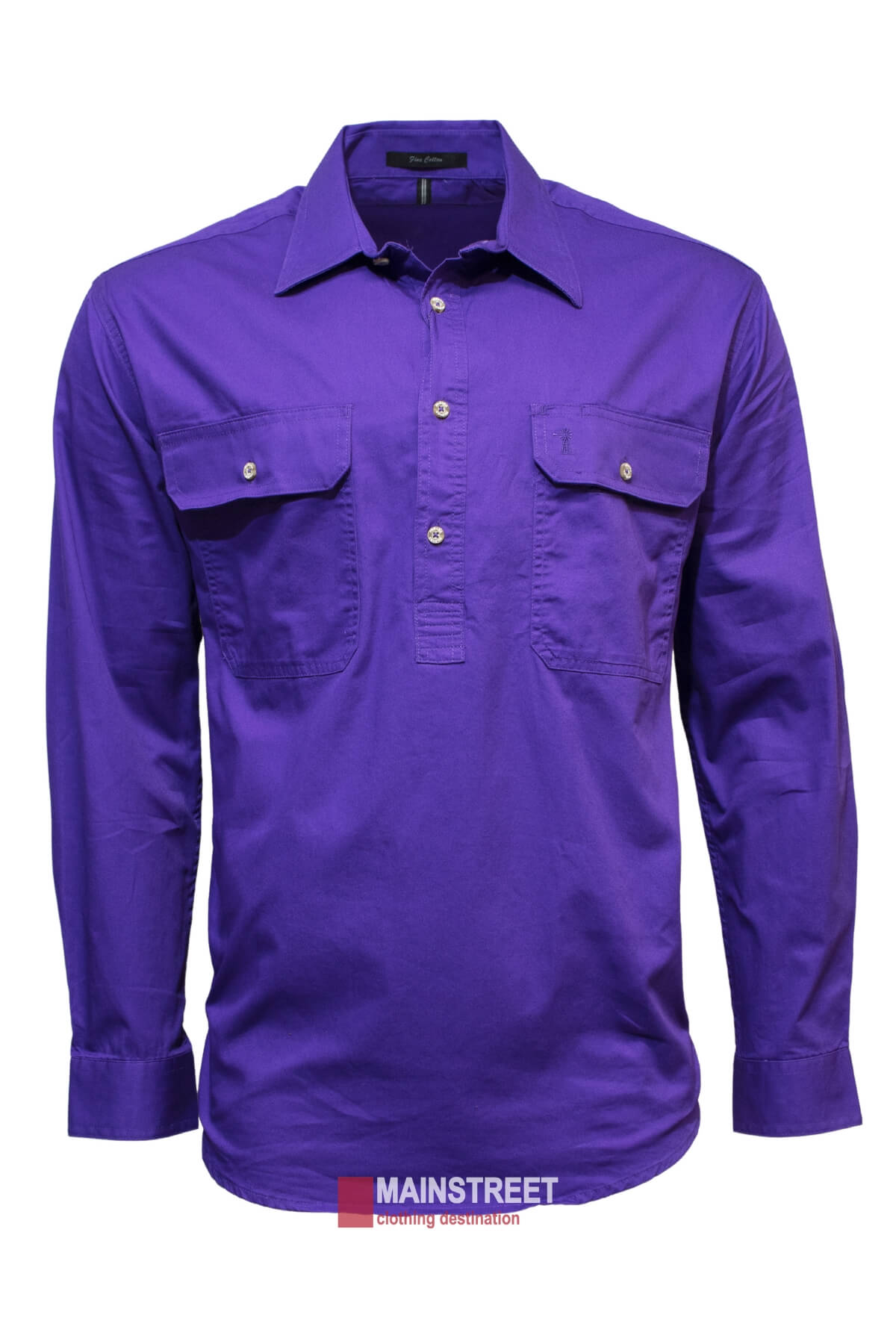 The Ritemate Pilbara Long Sleeve Closed Front Shirt for men is a purple work shirt made from 100% cotton. It features two chest pockets with button flaps, a Mainstreet logo at the bottom, and offers a UPF rating of 50+ for enhanced sun protection. The shirt also has a partial button placket in the front.