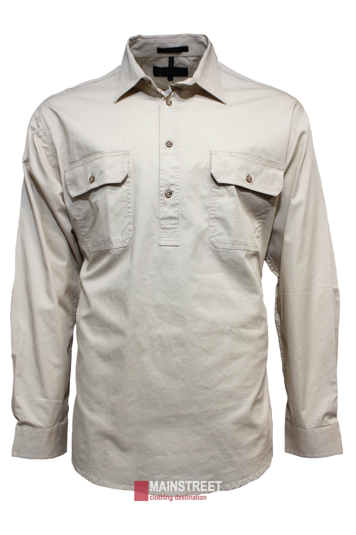 The Ritemate Pilbara Long Sleeve Closed Front Shirt for men, in beige, features a collared neckline, a button-up front, and two chest pockets. Crafted from 100% cotton for a relaxed fit with buttoned cuffs, it boasts an impressive UPF rating of 50+ for excellent sun protection while maintaining style. Displayed against a plain white background with the "Mainstreet clothing destination" label at the bottom.