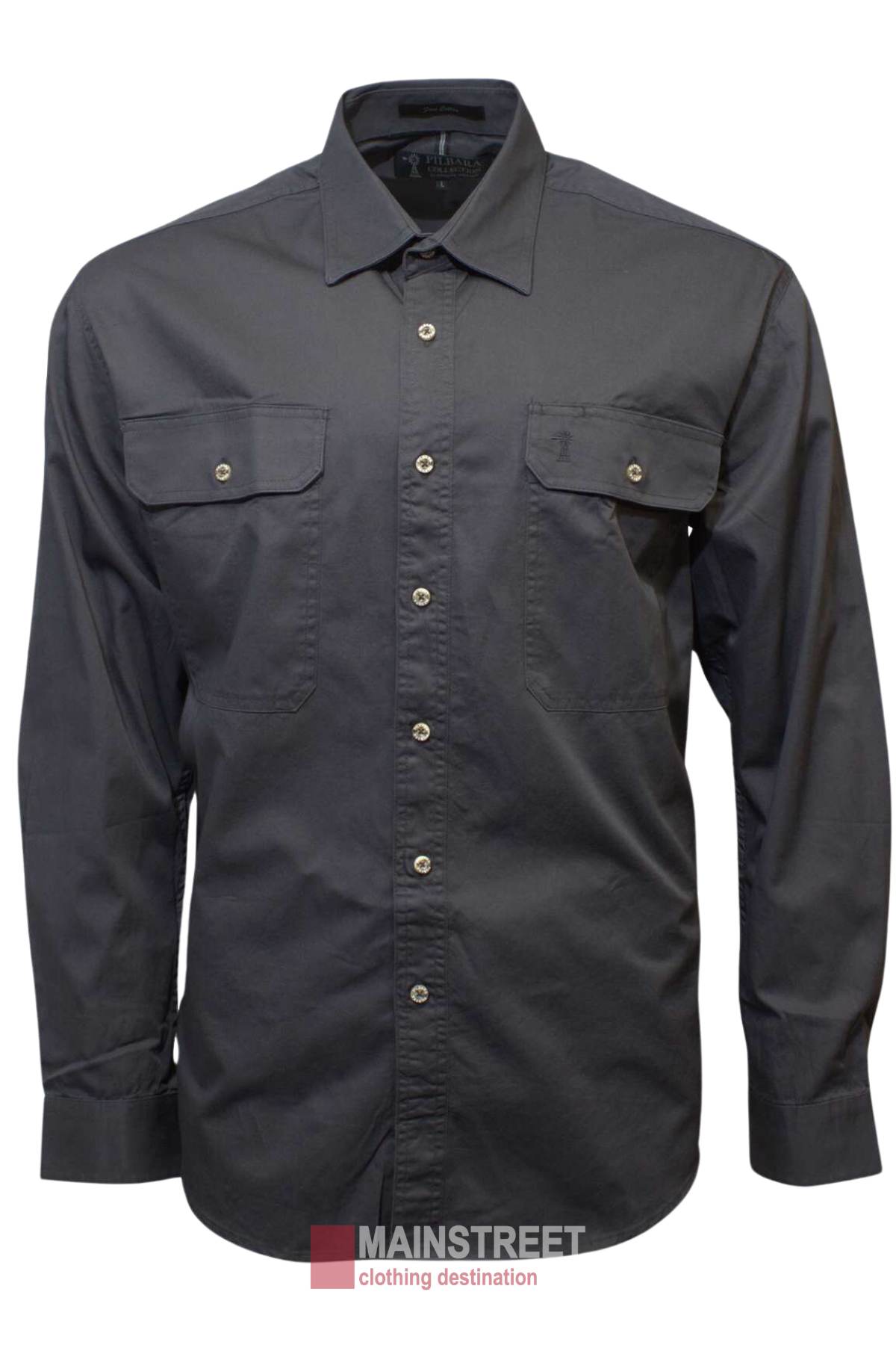 The Pilbara Open Front Shirt is a long-sleeved, dark grey men's work shirt made from 100% cotton with UPF 50+ sun protection. It has two chest pockets with buttoned flaps and features the "Mainstreet clothing destination" label at the bottom.