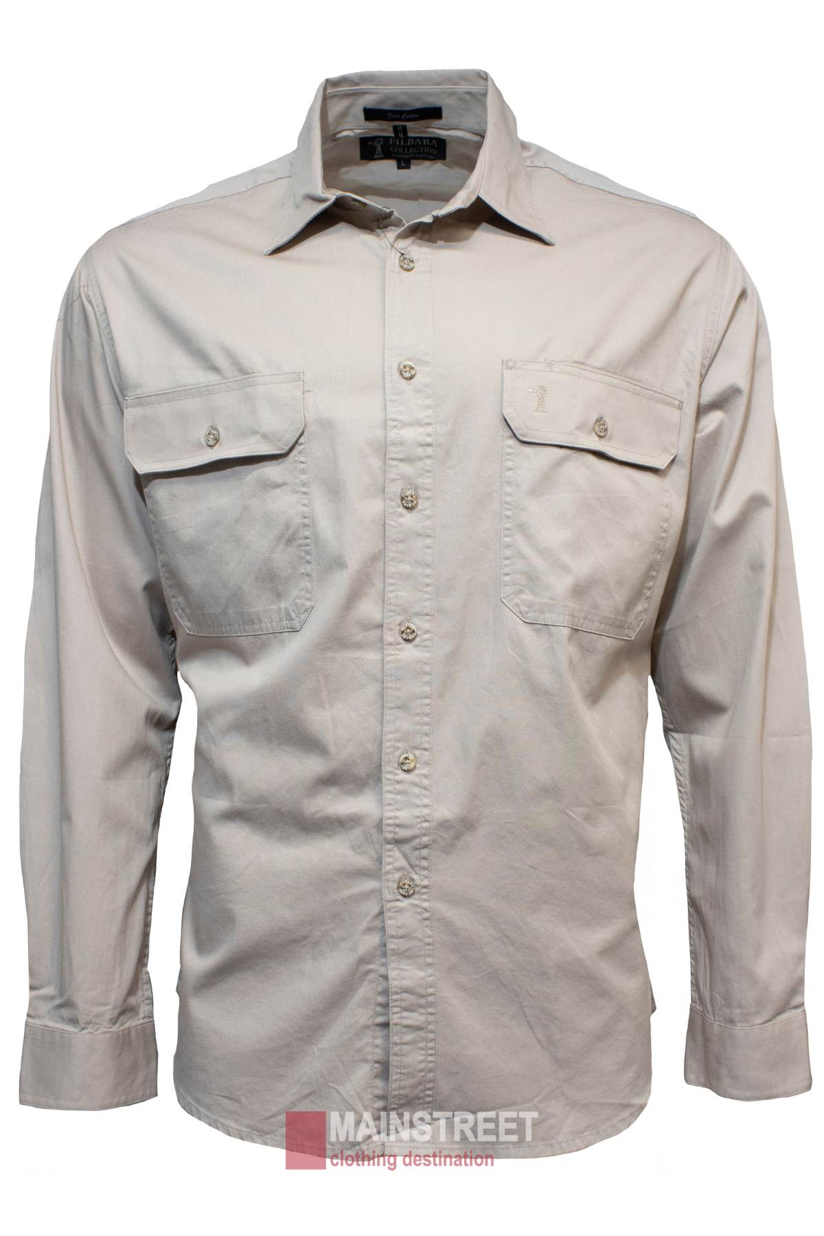 The beige Pilbara Open Front Shirt for men is made from 100% cotton and features long sleeves and two chest pockets. Displayed on a plain white background, the label reads "Mainstreet clothing destination." It has a UPF 50+ rating for superior sun protection while maintaining classic style.
