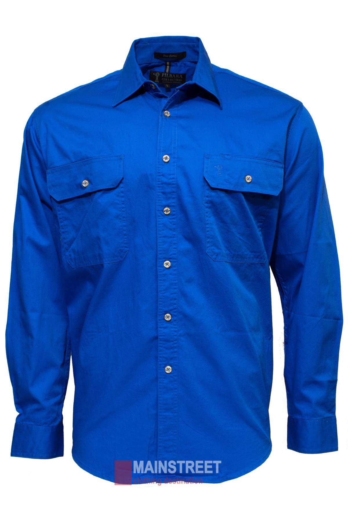 The Pilbara Open Front Shirt is a men’s long-sleeve, button-up, royal blue work shirt made from 100% cotton with UPF 50+ protection, featuring two chest pockets and silver buttons. The MAINSTREET logo appears bottom center of the image.