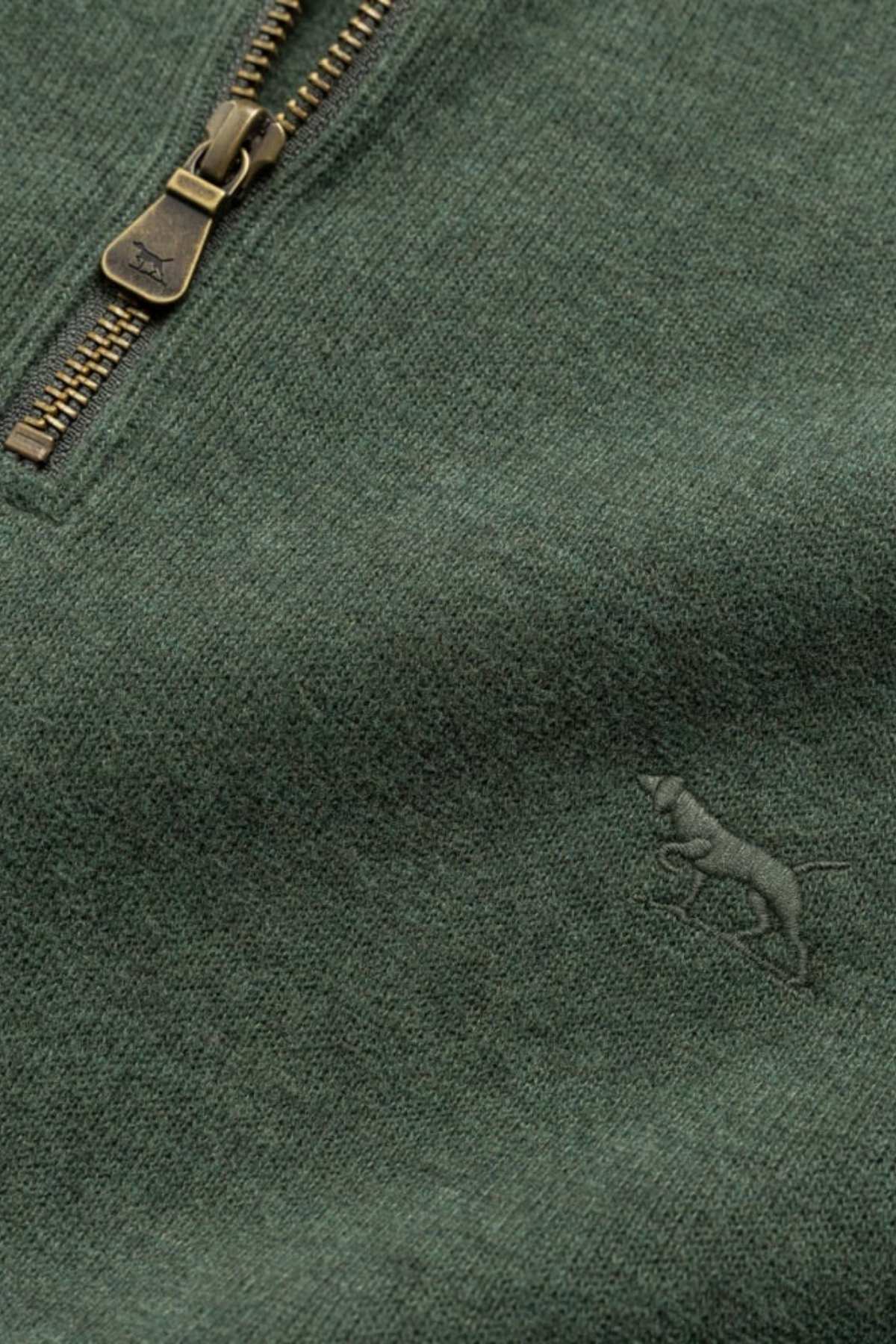 Close-up of the Rodd & Gunn Alton Ave Sweat, a green half zip sweater featuring a zipper with a dog logo pull and an embroidered small dog design. The finely knit texture offers comfort and style.