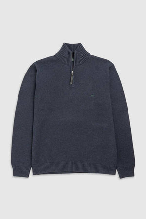 The Rodd & Gunn Merrick Bay Knit is a dark grey, long-sleeved sweater that features a high ribbed collar and a half-zipper front closure. Made from 100% cotton soft, knitted fabric, it has a slightly fitted design and comes with a premium YKK zip. Additionally, there is a small, subtle logo embroidered on the left chest.