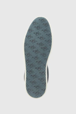 The image features a Rodd & Gunn Transit Sneaker sole with a dark blue and black hexagonal tread and white border, displayed on a light gray background.