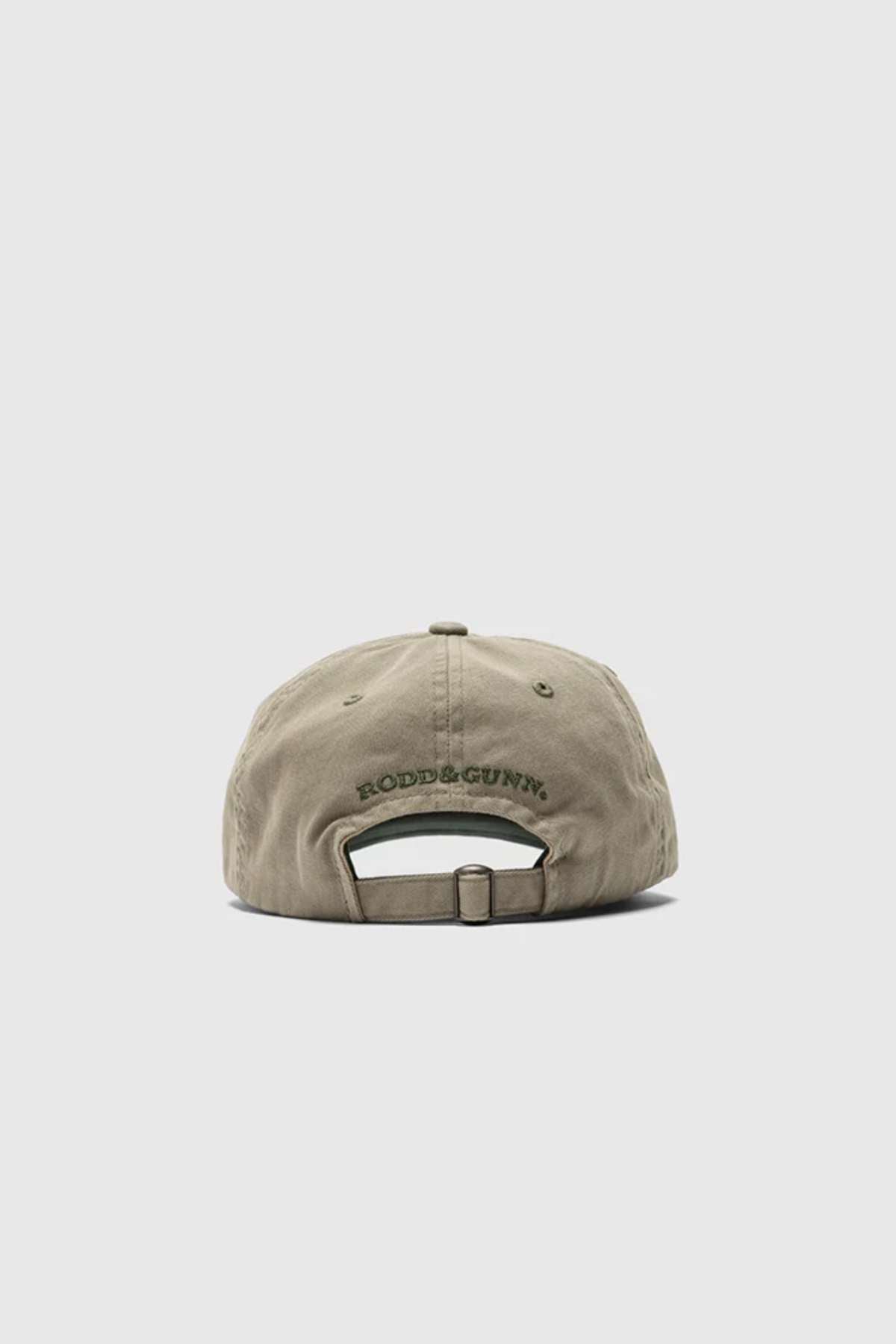 The essential Rodd & Gunn Gunn Cap, made from cotton twill in olive green, includes an adjustable strap with the brand's name embroidered in dark lettering for style and comfort.