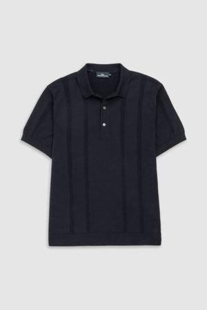 The Rodd & Gunn Brooklands Knit is a short-sleeved, dark navy polo crafted from premium Australian cotton, featuring a collar, two-button placket, and subtle vertical textured stripes, shown on a plain light gray background.