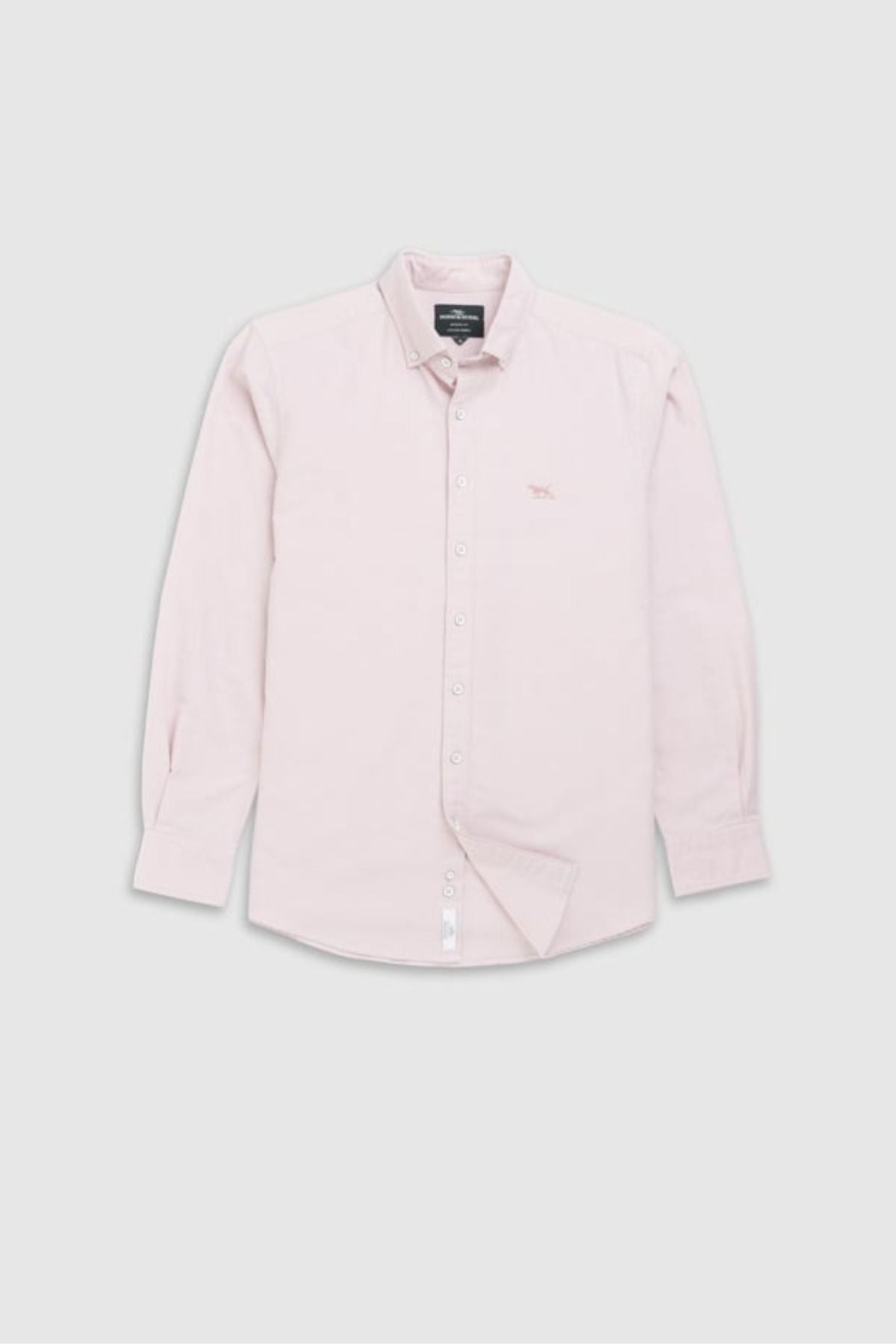 The Rodd & Gunn Gunn Oxford Sports Fit Shirt, in light pink 100% cotton with long sleeves, a collar, buttoned cuffs, and an embroidered chest logo, is shown against a plain light gray background.