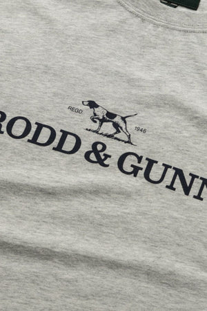 A close-up of the Rodd & Gunn The Logo Tee 2.0, a men’s cotton sports fit t-shirt, with a black outline of a hunting dog above "RODD & GUNN" and "REGD 1946" near the graphic.