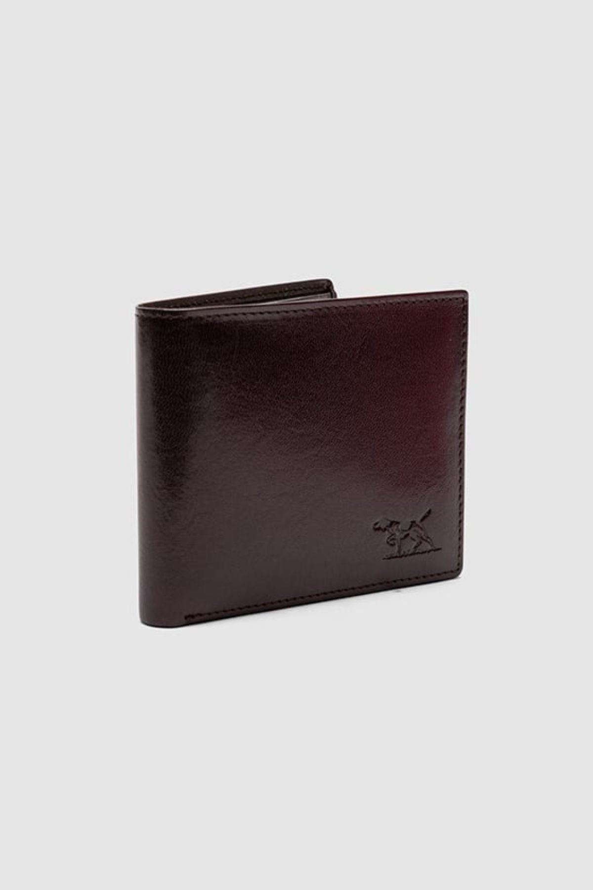 The Rodd & Gunn Wakefield Bi-Fold Wallet is crafted from dark brown Italian leather with a subtle embossed logo in the bottom right corner, shown against a plain light gray background.
