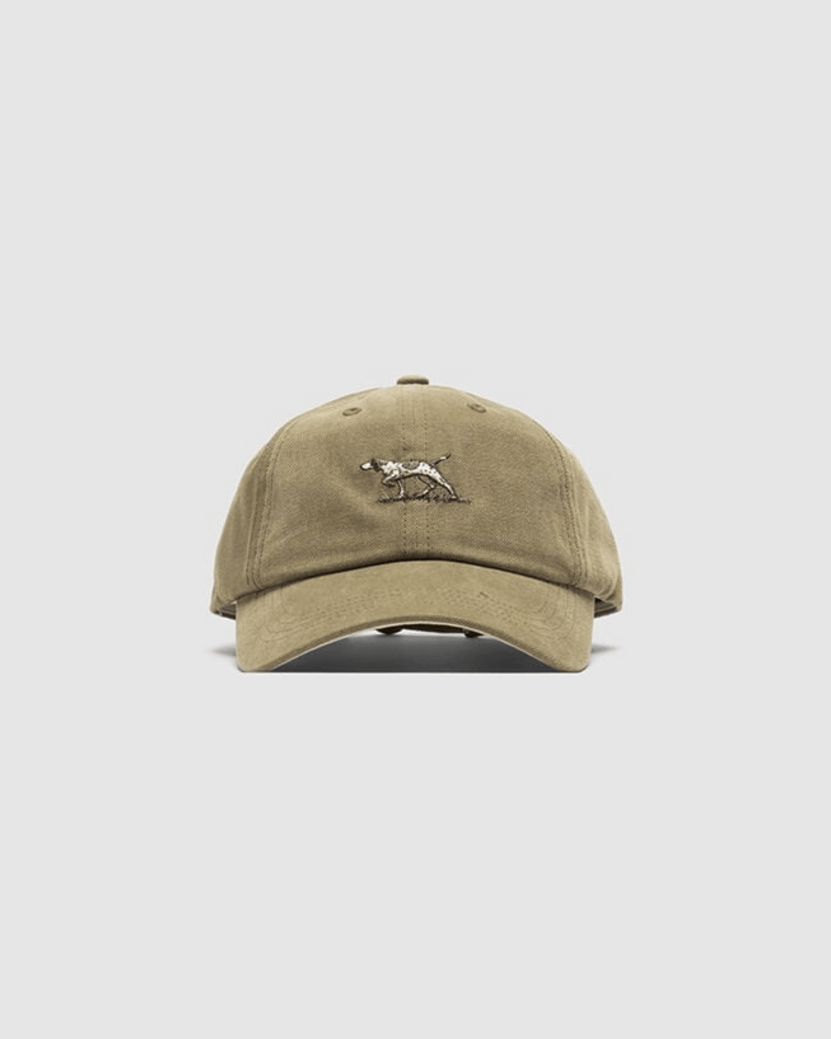 The Rodd & Gunn Signature Cap is a beige cotton twill baseball cap with an embroidered dog in a hunting pose, set against a light gray background for added style and comfort.