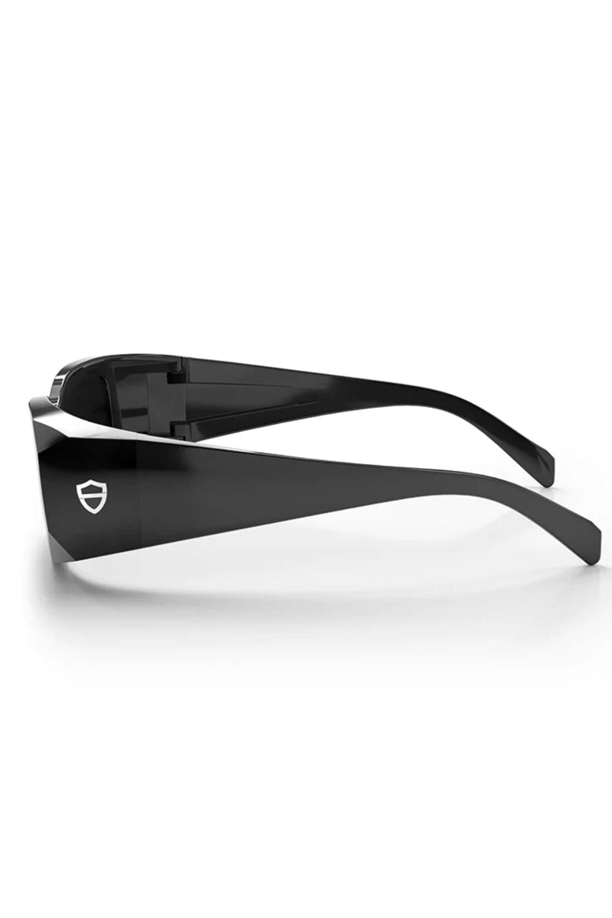 Side view of SafeStyle Auras Black Frame Grey Polarised Lens safety glasses with thick arms and a small white shield-shaped logo on the side, displayed against a plain white background.