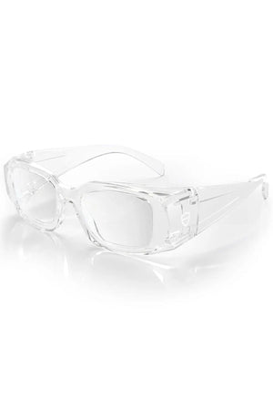 The SafeStyle Auras Clear Frame Clear Lens safety glasses feature shatterproof polycarbonate frames, UV400 lenses, and a wide rectangular design with thick transparent arms. Displayed on a white background with a subtle reflection.