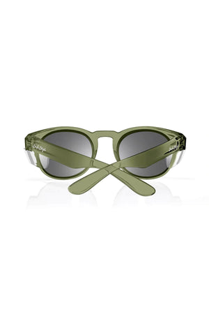 SafeStyle Cruisers has glossy green, round polycarbonate frames with crossed arms and visible text. Dark polarised lenses offer UV protection. Image shows them on a white background.