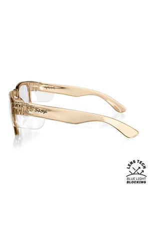 Side view of SafeStyle Fusions in a champagne frame with blue light lens, featuring the brand name on the arm. The corner inscription "Lens Tech Blue Light Blocking" emphasizes its UV protection.
