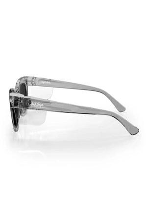 Side view of SafeStyle Harps graphite frame sunglasses featuring transparent, polarised lenses with UV protection. The sleek, curved arms complement the modern shatterproof design.