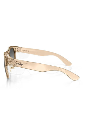 Side view of SafeStyle Cruisers Champagne Frame Tinted Lens sunglasses featuring thick, glossy arms with a signature logo by the hinge and slightly tinted UV400 polycarbonate lenses for protection.