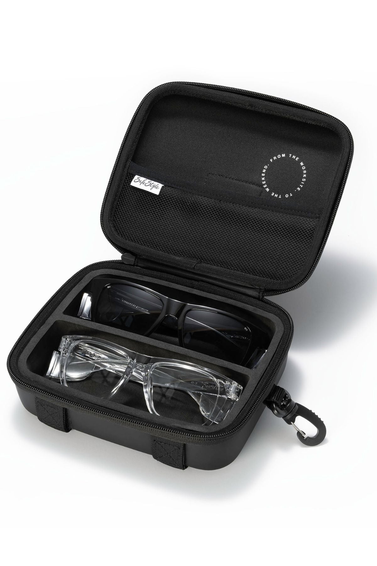 The Safestyle Double Hardcase is a black EVA zip case with a mesh pocket and carabiner, shown on a white background with two eyeglasses—one clear-framed, one dark-framed—inside. Perfect for convenient storage of safety glasses.