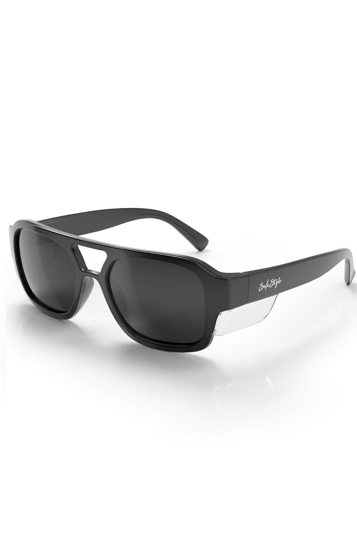 The Safestyle Skylines sunglasses feature a black frame, grey polarised lenses with UV400 protection, wide arms accented by a subtle silver logo, and clear side shields—displayed against a plain white background.