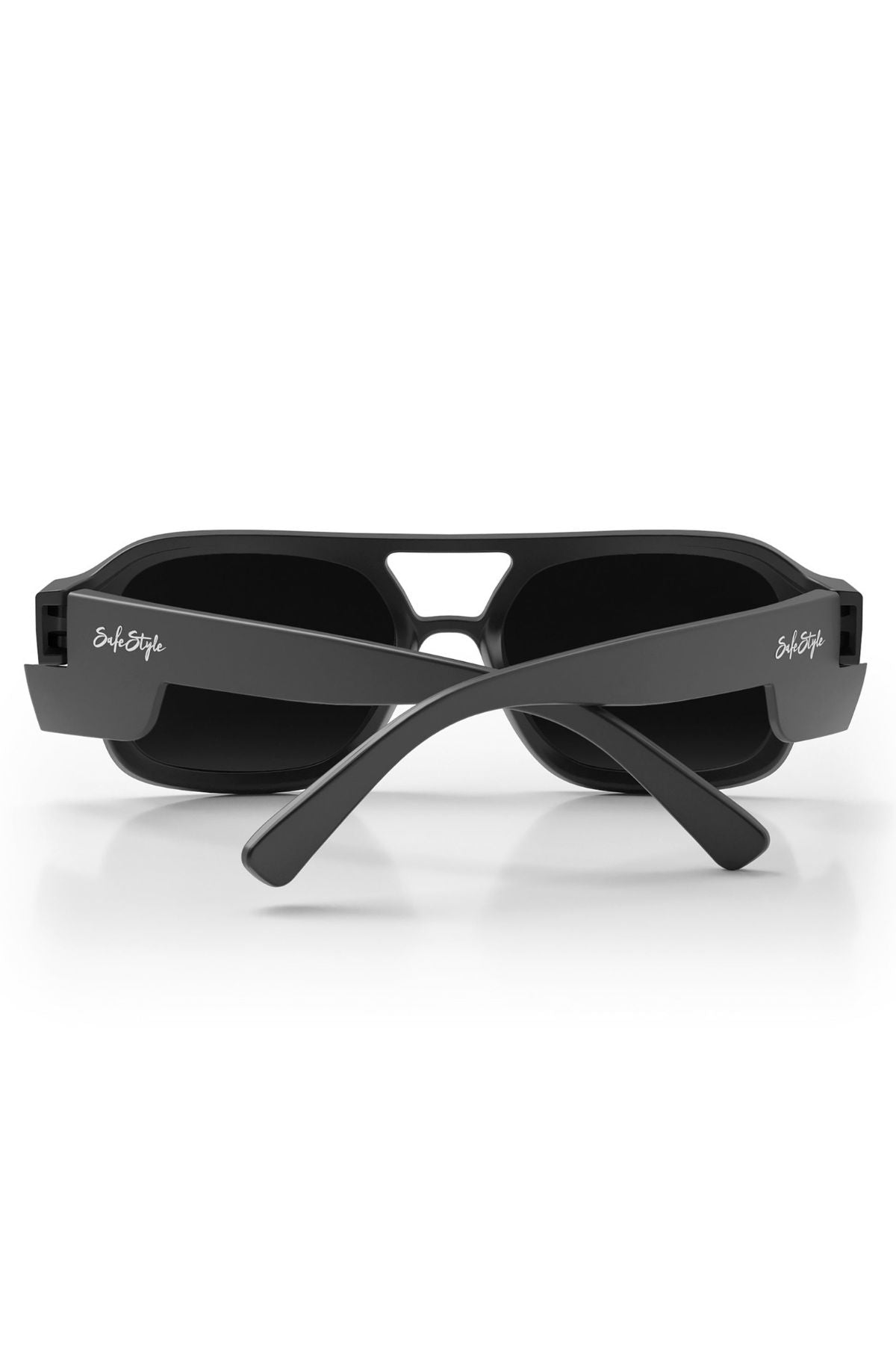 The SafeStyle Skylines feature a matte black frame, grey polarised lenses, thick vintage-inspired design, and "SafeStyle" in white on each temple, shown with the crossed temples facing the viewer.
