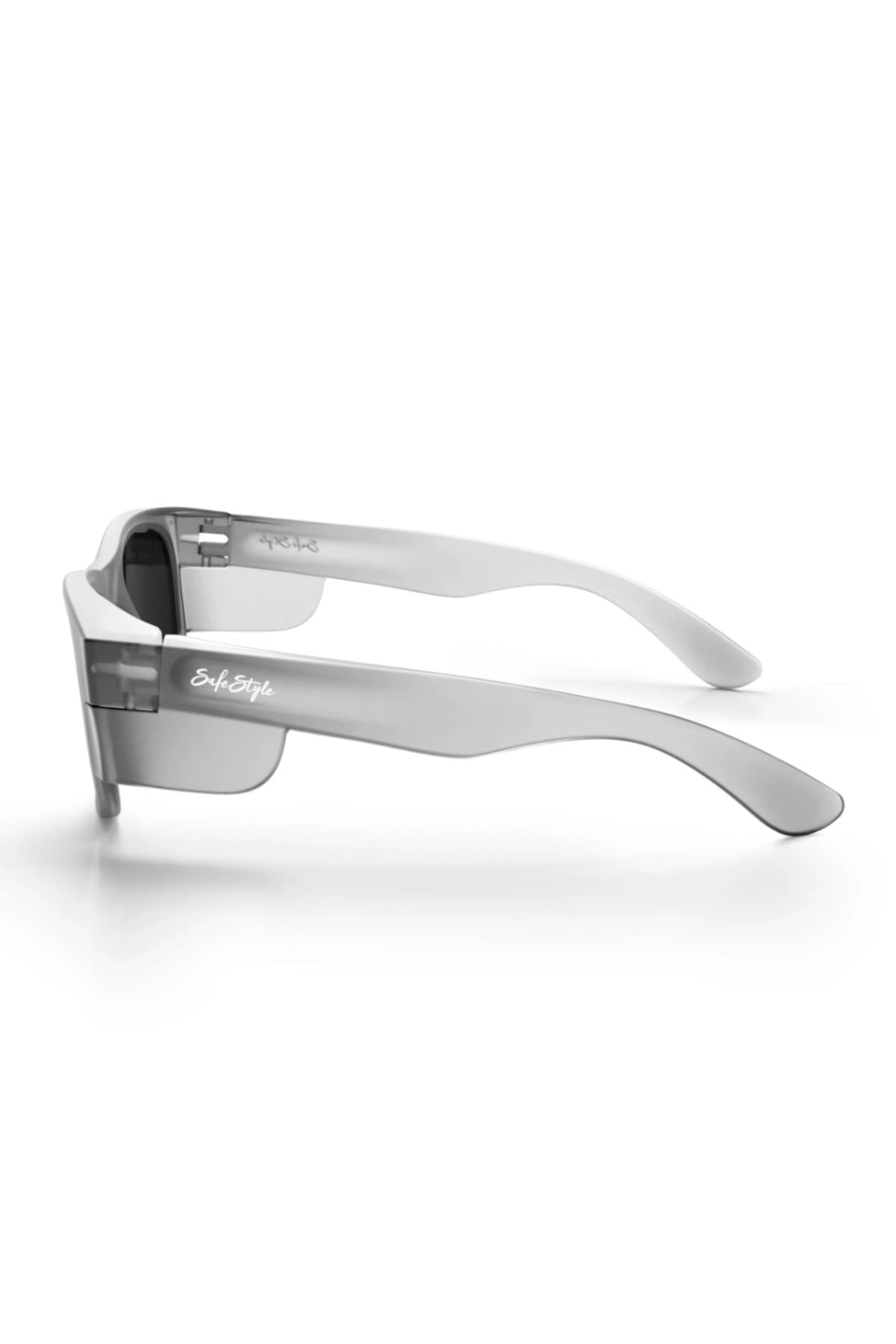 Side view of Safestyle Classics Matte Graphite polarised sunglasses with thick polycarbonate frames and dark lenses. The Safestyle logo appears on the left arm. UV400 protection. Set against a plain white background.