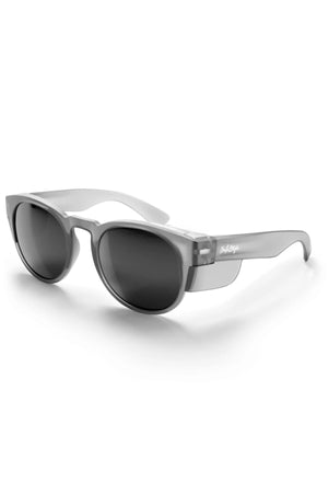 Safestyle Cruisers sunglasses feature a matte graphite frame, polarised round black lenses, and slightly thick arms. "Shady Rays" is displayed on the left arm near the hinges. Shown angled on a white background for stylish protection.