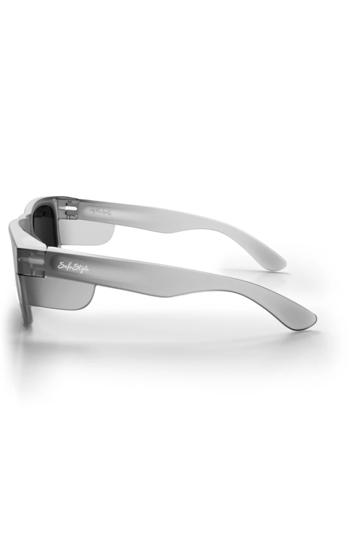The Safestyle Fusions Matte Graphite Frame Polarised Lens sunglasses feature thick, transparent arms with "SoFetch" in white and dark UV400 polarised lenses, shown from the side on a white surface for a stylish look.