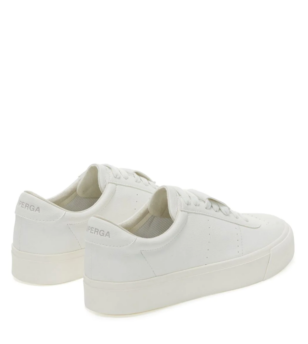 The Superga 4834 Club S sneakers are white low-tops with a minimalist design made from grape-based faux leather. They have a thick vulcanized rubber sole, subtle stitching, tonal laces, and the brand name embossed on the heel tab. The image shows back and side views.