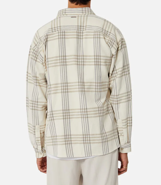 A person is seen from the back wearing the Industrie The Danville Shirt—a stylish, regular fit cream plaid shirt with light gray and beige stripes in 100% cotton—paired with light pants against a plain white background.