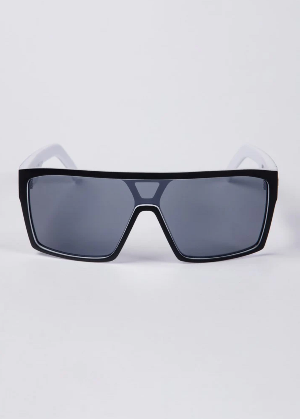 UNIT Command Polarised Eyewear features modern, oversized rectangular sunglasses with a thick black frame, dark tinted polarised lenses offering UV protection, displayed against a plain light background.