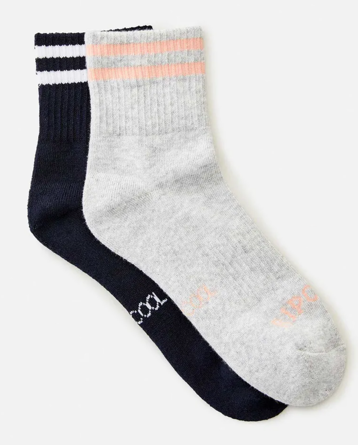The Rip Curl Women's VaporCool Sport Sock 2 Pack includes a pair of ankle socks, one in heather gray with pink stripes near the cuff and the other in dark navy featuring white stripes near the cuff. Both socks showcase the Rip Curl brand name at the toes. Designed for comfort, these VaporCool Sport socks are moisture-wicking to ensure your feet stay dry on a white background.