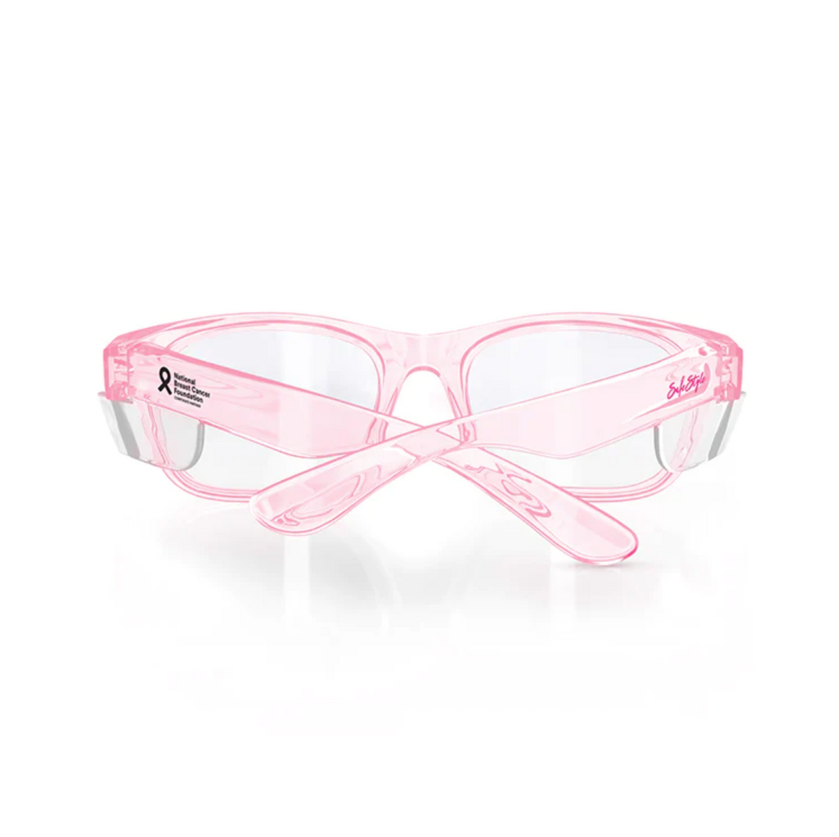 The SafeStyle Classics Pink Frame Clear Lens features UV400 protection, clear lenses, and a semi-transparent pink frame with a breast cancer awareness ribbon and logo. Stylish crossed arms at the back complete this safety-rated design.