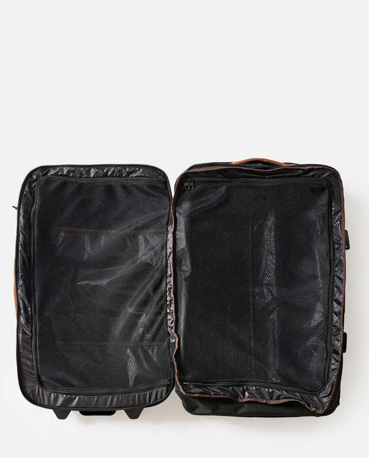An open, empty black Rip Curl F-Light Global 110L Searchers Travel Bag with mesh compartments, made from durable CORDURA recycled polyester, lies flat on a white background.