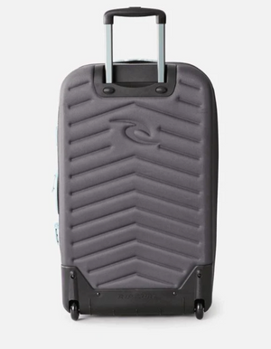 The Rip Curl F-Light Global 110L Sessions Travel Bag, in gray with a chevron pattern and made from recycled polyester, has two wheels and an extended telescopic handle, shown upright on a white background.