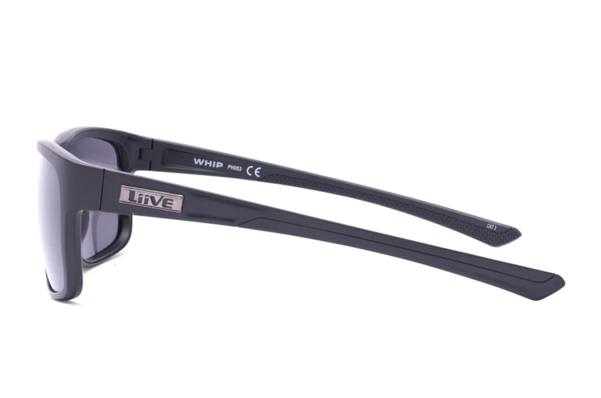 Black Liive Whip Polar Sunglasses feature a side view with the brand name on the temple. Made of lightweight polycarbonate, they present a sleek design with dark polarized UV-protective lenses and the model "WHIP" engraved on the arm.