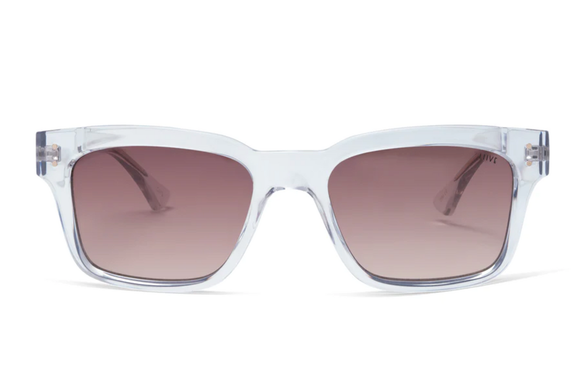 The Liive Dan Sunglasses feature a clear rectangular polycarbonate frame and gradient brown lenses with UV protection, shown against a white background.