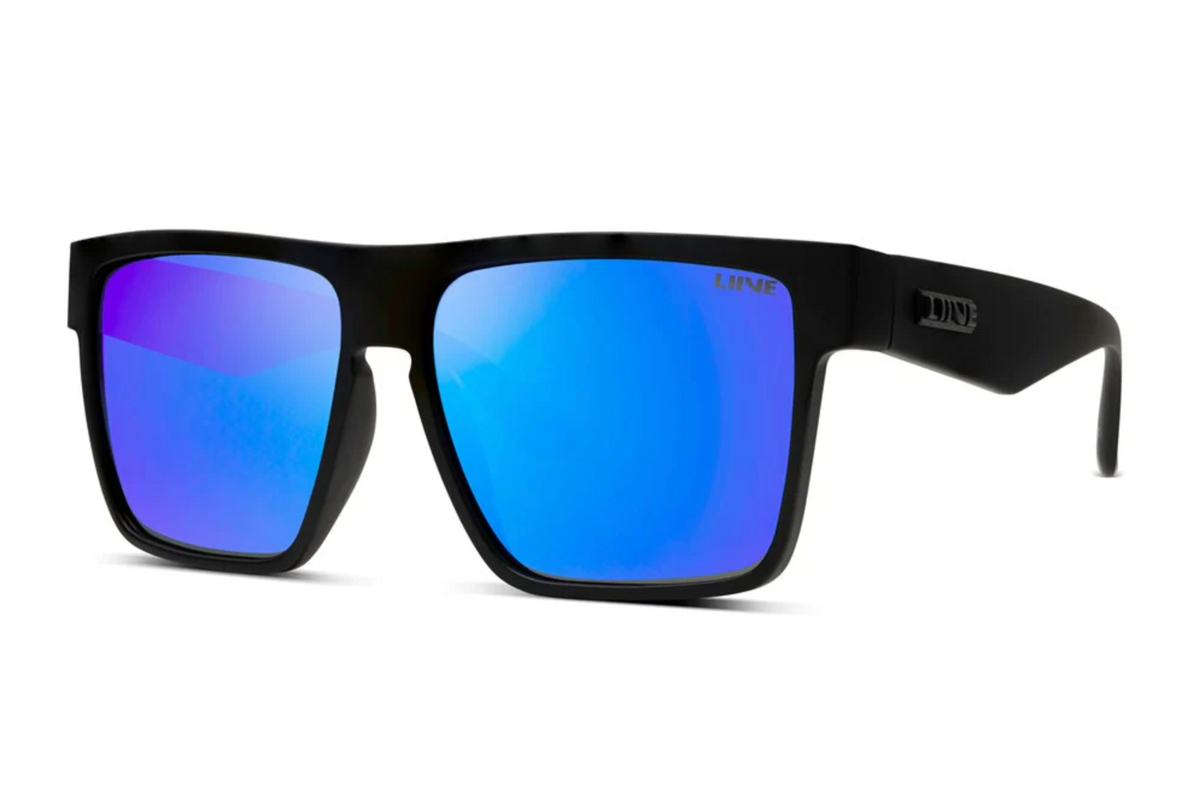 The Liive Greed Mirror Polar Float Sunglasses feature black plastic frames and UV-protected polarized blue lenses angled slightly left, with "DIVE" visible on the arm.