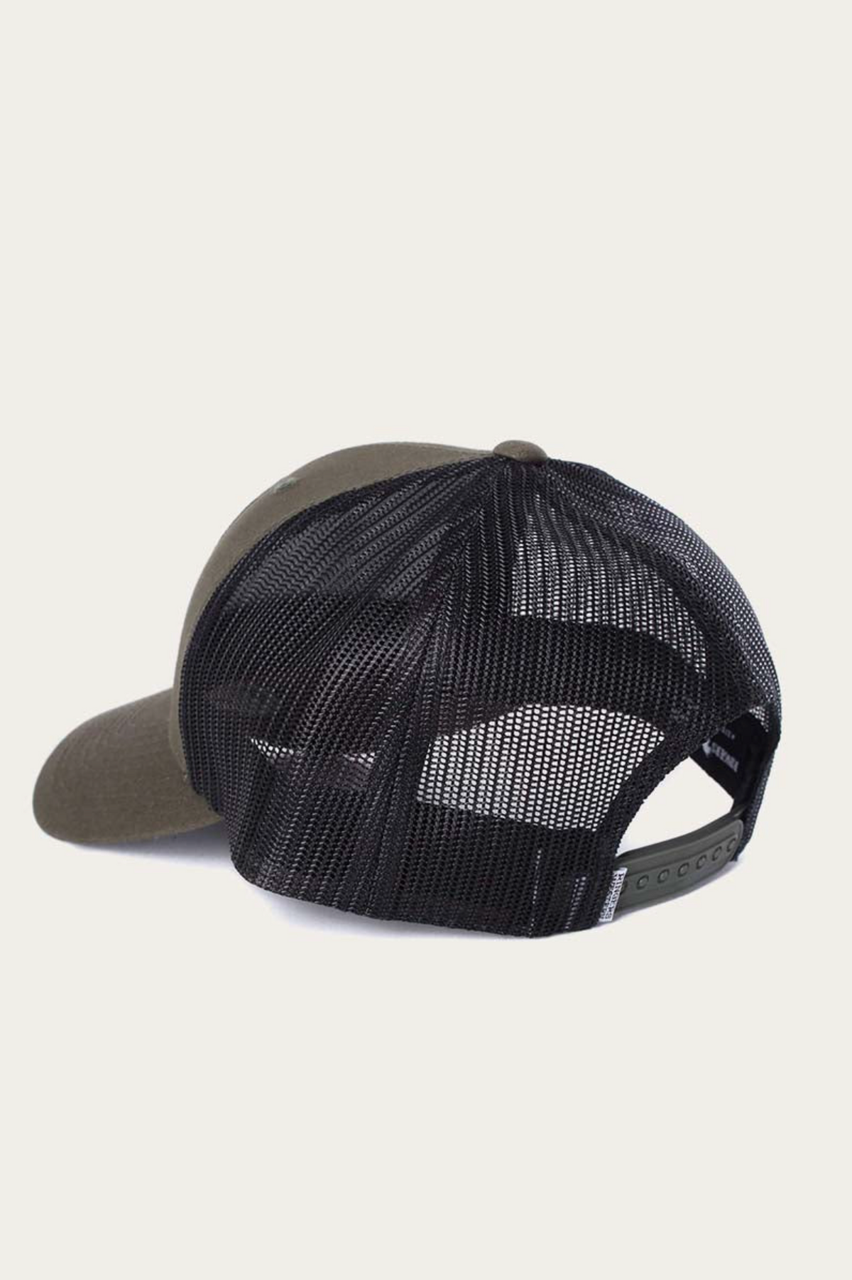 The Ringers Western Signature Bull Trucker Cap is shown from the back, highlighting its dark color, black mesh panel, adjustable snapback closure, and solid cotton twill front.