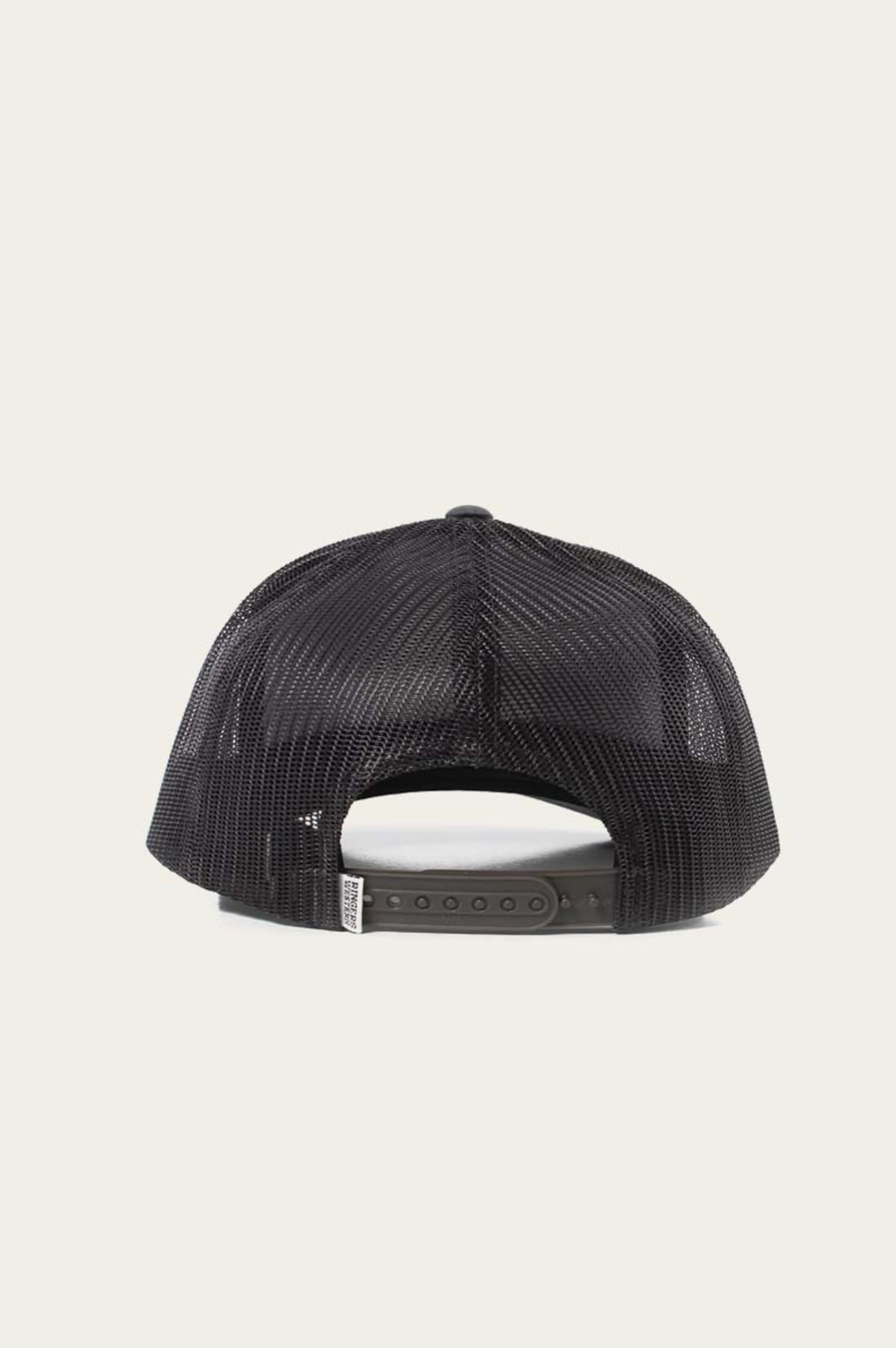 The Ringers Western Signature Bull Trucker Cap is shown from the back, featuring a black mesh back, adjustable snapback closure, and a small white tag on the left side.